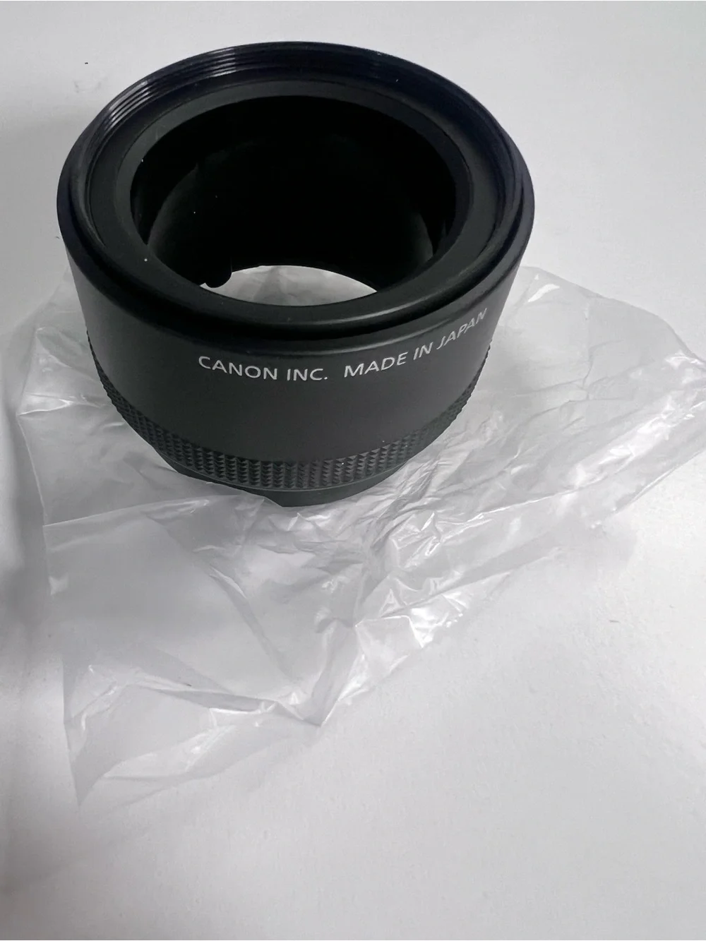 Canon FA-DC58D Filter Adapter in Black and Red Packaging